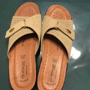 Beige slip on Sandals.  Wore once. Too big.